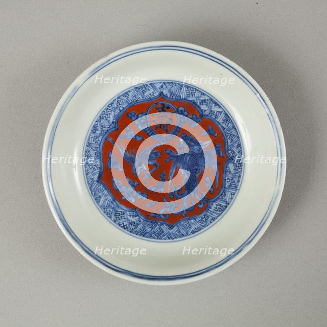 Red clobbered blue and white saucer with stork, phoenix and dragons, Jiajing (1522-1566). Artist: Unknown.