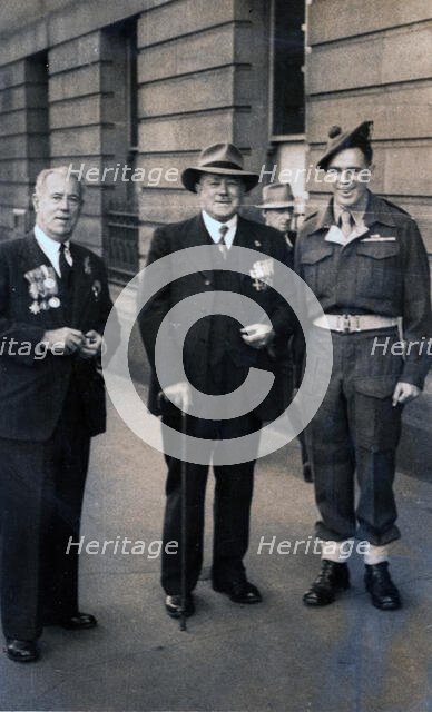 Captain Frank Page MC (centre), Anzac Day march, year unknown. Creator: Unknown.