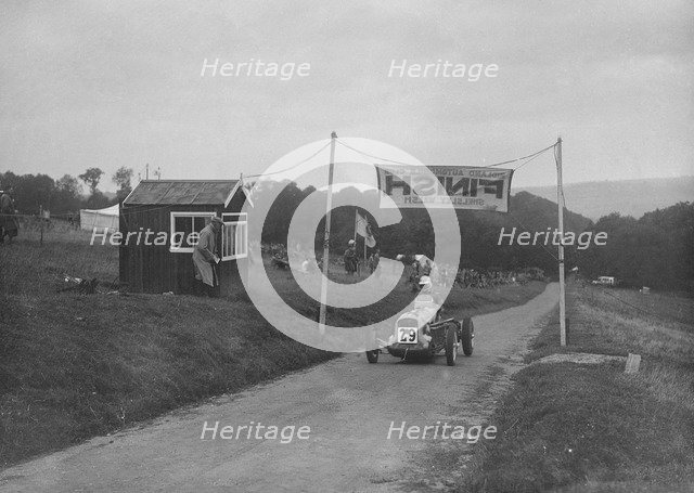 MG racing single-seater at the finish of the Shelsley Walsh Hillclimb, Worcestershire, 1935. Artist: Bill Brunell.