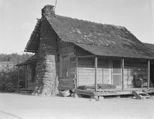 House occupied by sharecropper family for seven years, Near Hartwell, Georgia, 1937. Creator: Dorothea Lange.