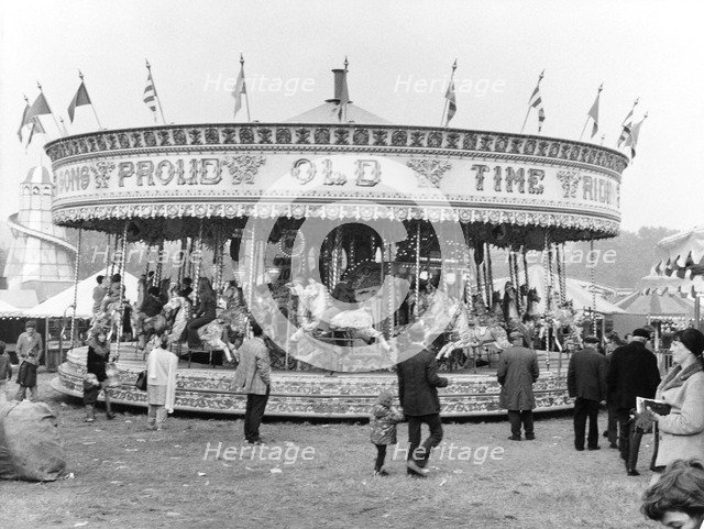 James Noyce's 'Galloping Horses' carousel ride, Goose Fair, Nottingham, Nottinghamshire, 1973. Artist: WE Middleton & Son