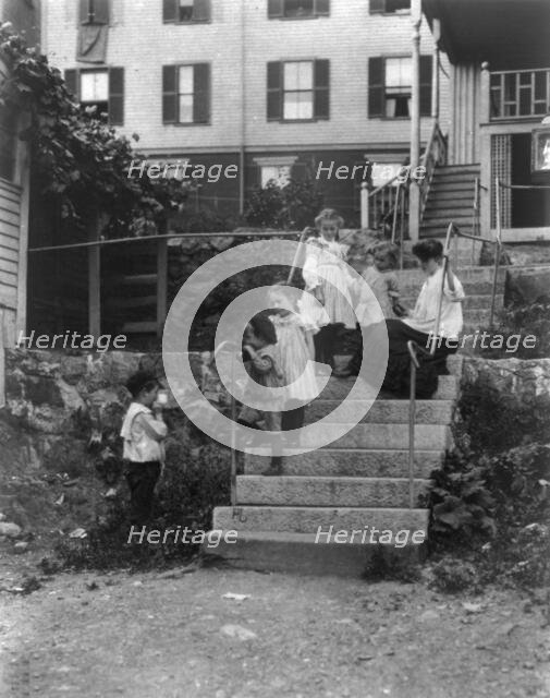 Woman on steps with 5 children, Lynn, Mass., (1895?). Creator: Frances Benjamin Johnston.