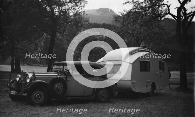 1937 Mercedes Benz 260D Cabriolet towing caravan. Creator: Unknown.