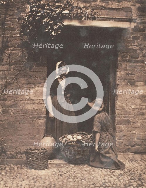 [Two Women, One Kneeling and One Standing, Looking into Basket Filled with Vegetables], 1853-56. Creator: John Dillwyn Llewelyn.