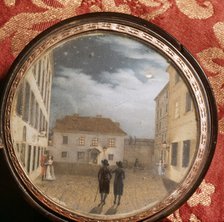A snuff box which belonged to Beethoven, decorated with a miniature painting depicting a street scene.