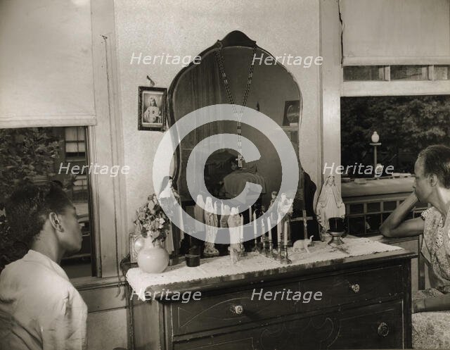 Mrs. Ella Watson, a government charwoman and her adopted daughter, Washington, D.C., 1942. Creator: Gordon Parks.