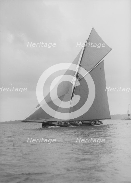 The gaff rigged cutter 'Bloodhound' sailing close-hauled, 1913. Creator: Kirk & Sons of Cowes.