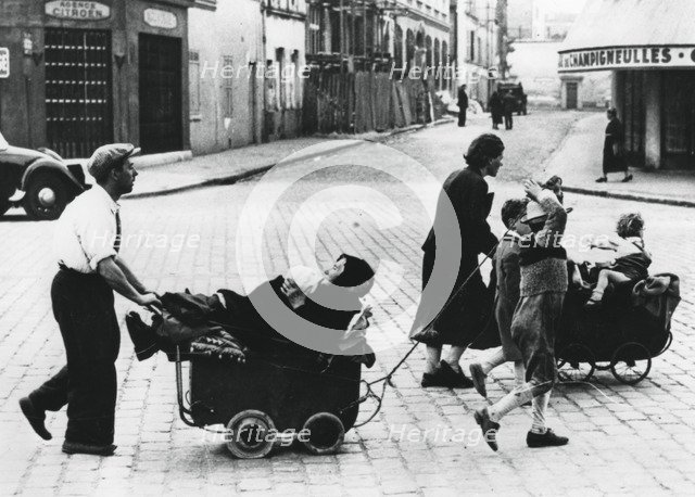 French refugees returning home after the fall of France to the Germans, France, July 1940. Artist: Unknown