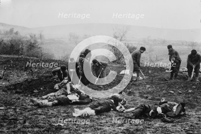 Burying dead at Tchataldja #3, between c1910 and c1915. Creator: Bain News Service.