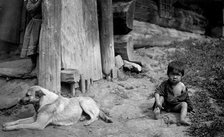 A Child with a Dog by a Yurt, 1913. Creator: GI Ivanov.