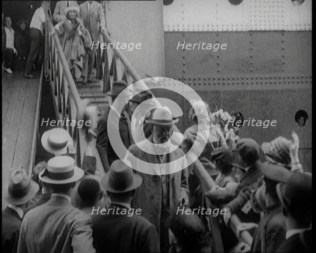 Mary Pickford Walking Down the Gangplank to Disembark from an Ocean Liner in the United Kingdom,1920 Creator: British Pathe Ltd.