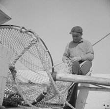 Frank Mineo, owner and skipper of the New England fishing boat..., Gloucester, Massachusetts, 1943. Creator: Gordon Parks.