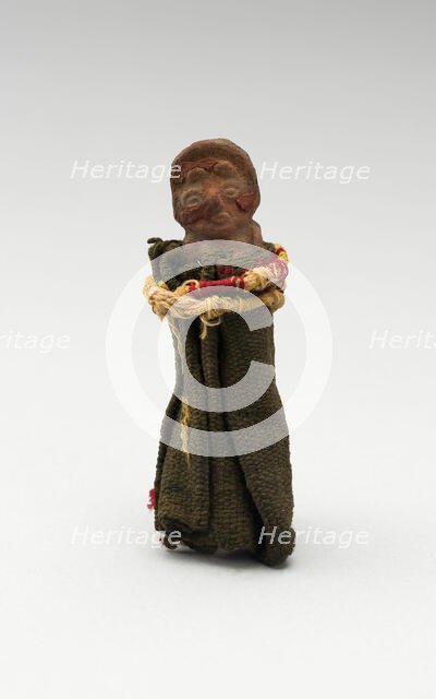 Mold-Made Female Figurine Wrapped in Cloth and Tied with String, c. A.D. 100/600. Creator: Unknown.