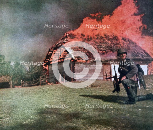 'Through the curtain of flame German observers move forward', Russia, 1941. Artist: Unknown