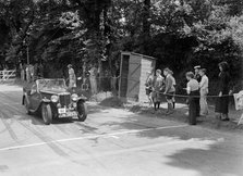 FE Ainley's MG Magnette NA, winner of a bronze award at the MCC Torquay Rally, July 1937. Artist: Bill Brunell.