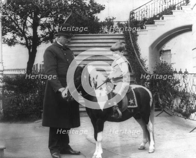Quentin Roosevelt instructed in horsemanship at the White House, c1902 June 17. Creator: Frances Benjamin Johnston.