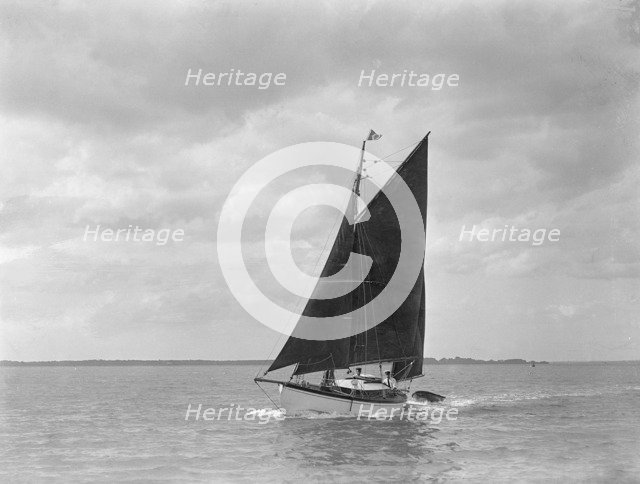 The 6 ton ketch 'Shona' under sail, 1921. Creator: Kirk & Sons of Cowes.