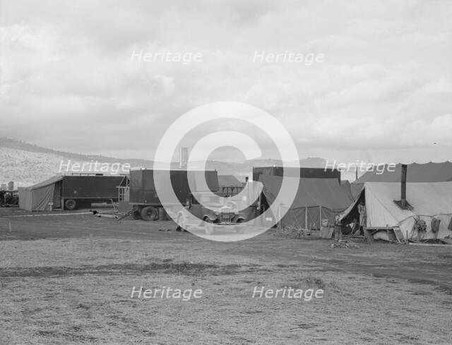Shows pickers' tents, power unit and shower bath..., FSA camp, Merrill, Klamath County, Oregon, 1939 Creator: Dorothea Lange.