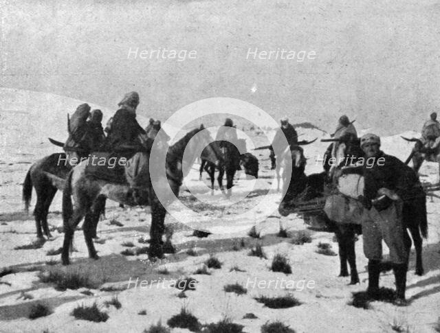 ''Les Alpins Marocains; Mokhazenis a cheval, emportant leurs skis en travers de la selle', c1916. Creator: Unknown.