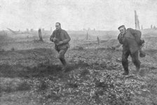 'Notre offensive du 15 decembre 1916; Deux Allemands sortent d'un abri depasse par notre premiere va Creator: Unknown.