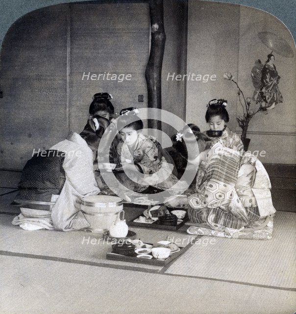 Geishas at dinner, Tokyo, Japan, 1904. Artist: Underwood & Underwood