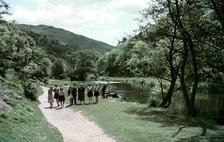 People walking alongside a river in Dovedale, Derbyshire, c1955-1965. Creator: Arthur Charles Kirby Ware.