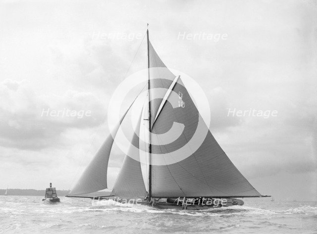 'The Lady Anne' spray over deck, sailing close-hauled, 1912. Creator: Kirk & Sons of Cowes.