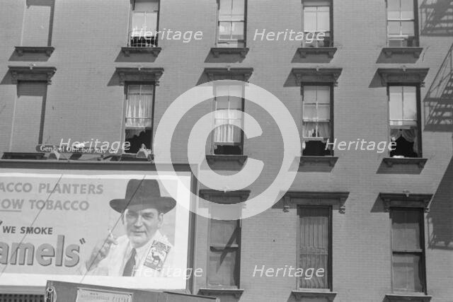 House fronts, 61st Street between 1st and 3rd Avenues, New York, 1938. Creator: Walker Evans.