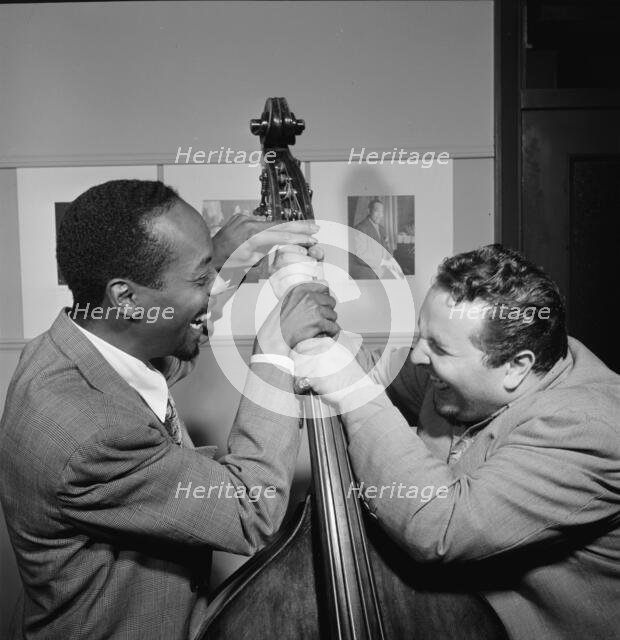 Portrait of Chubby Jackson and John Simmons, William P. Gottlieb's office, N.Y., ca. July 1947. Creator: William Paul Gottlieb.