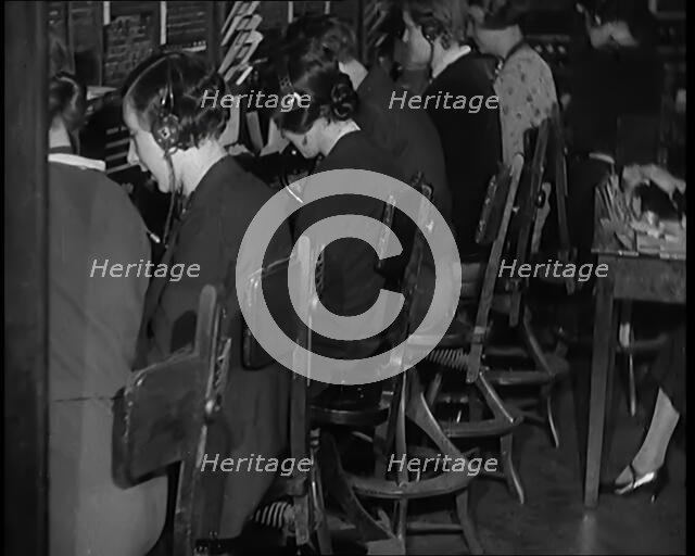 Female Civilians Working at the International Telephone Exchange, 1931. Creator: British Pathe Ltd.