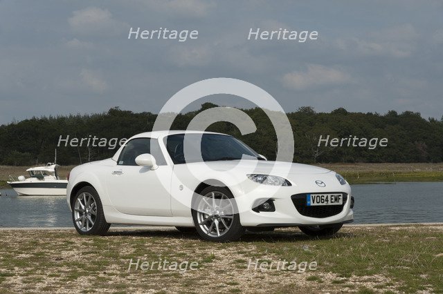 2014 Mazda MX5 Roadster Coupe Artist: Unknown.