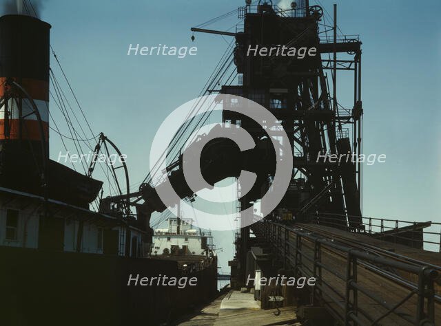 Loading a lake freighter with coal for shipment to other lake ports, Sandusky, Ohio, 1943. Creator: Jack Delano.