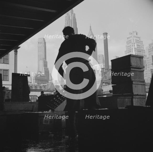 A scene at the Fulton fish market, New York, 1943. Creator: Gordon Parks.