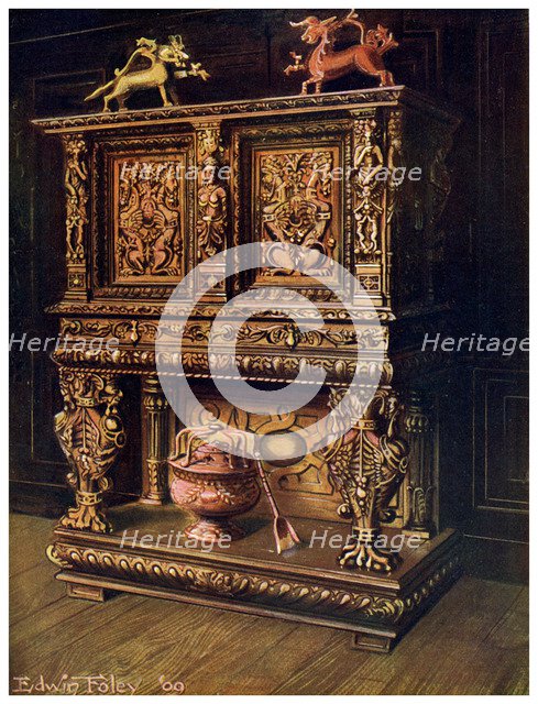 Carved Bourgouignon credence, 1910.Artist: Edwin Foley