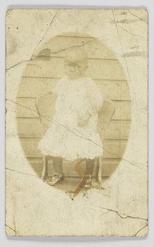 Photographic postcard of unidentified child, 1904-1918. Creator: Unknown.