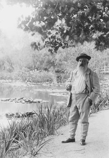 Claude Monet near the Water Lily Pond, 1905. Creator: Bulloz, Jacques-Ernest (1858-1942).