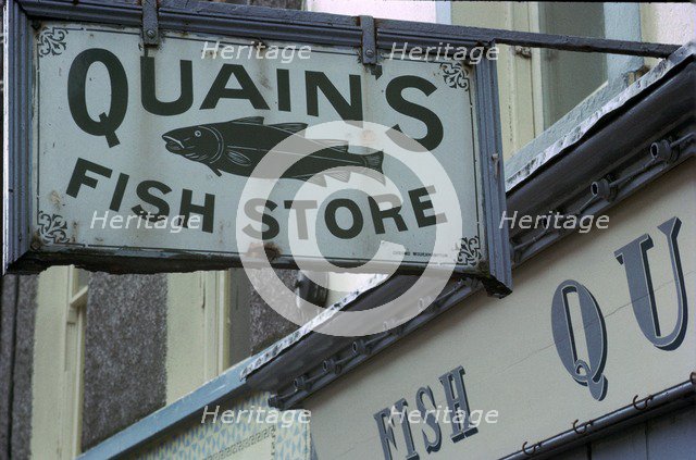 A sign in Youghal, Ireland. Artist: Unknown