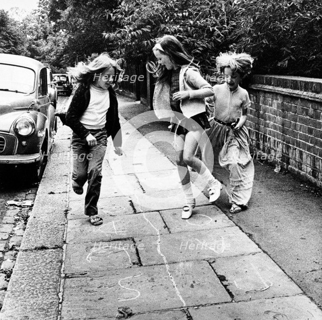 Children playing hopscotch on a London street, c1970. Artist: Henry Grant