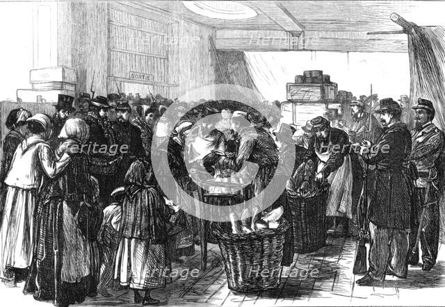 Relief of Paris: distribution of the English gift at the Magasin du Bon Marché, rue de Sèvres, 1871. Creator: Unknown.