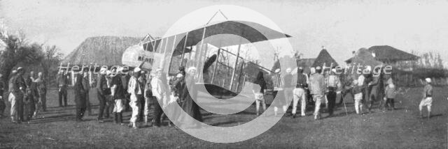 ''En campagne avec les Serbes; Pendant la retraite serbe par l'Albanie; biplan francais..., 1915. Creator: Unknown.