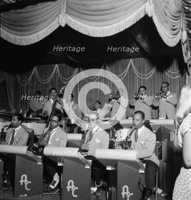 Portrait of Mario Bouza, Jose Mangual, Carlos Vidal(?), and Ubaldo...Glen Island Casino, N.Y., 1947. Creator: William Paul Gottlieb.