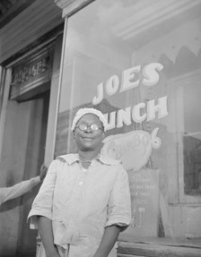 Shopper on Saturday afternoon, Washington, D.C., 1942. Creator: Gordon Parks.