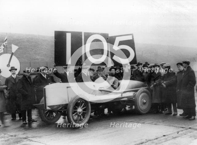 1913 Percy Lambert in Talbot Special 25hp at Brooklands, breaks 103 miles in 1 hour record. Creator: Unknown.