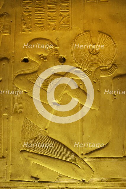 Pharaoh making an offering of a gold necklace, Temple of Seti I, Abydos, Egypt, New Kingdom (2003). Creator: LTL.