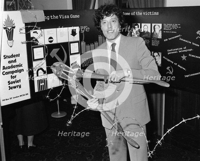 Tom Stoppard (1937-), British Playwright, opening an exhibition for Soviet Jewry. Artist: Sidney Harris