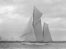 The 118 foot racing yacht 'Cariad', 1911. Creator: Kirk & Sons of Cowes.