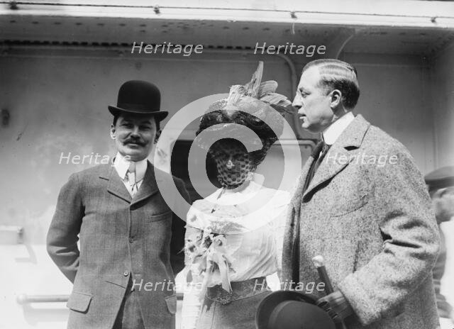 Mr. and Mrs. C.F. Bishop with Clifford Harmon, 1910. Creator: Bain News Service.
