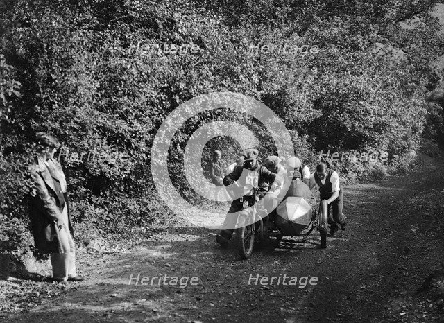 Motorcycle and sidecar competing in the Brighton and Hove Motor Club Brighton-Beer Trial, 1930. Artist: Bill Brunell.