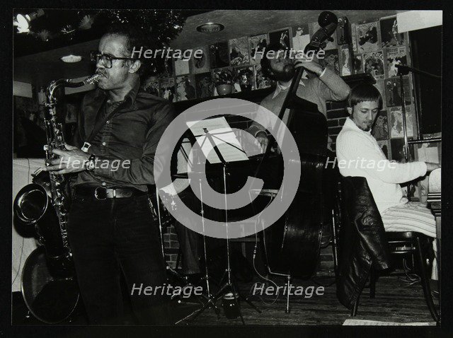 Art Themen, Dave Green, and Michael Garrick playing at The Bell, Codicote, Hertfordshire, 1981. Artist: Denis Williams