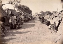 Pathway through the centre of a segregation camp during bubonic plague outbreak, Karachi, India,1897 Creator: Unknown.